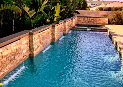 Custom-designed pool with water feature.